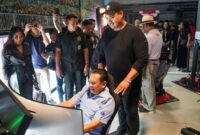 Menpora RI, Dito Ariotedjo saat menghadiri Grand Opening Tournament P1 Digital Motorsport, di Blackstone Garage, Kebayoran Baru, Jakarta, pada Minggu (25/2/2024).