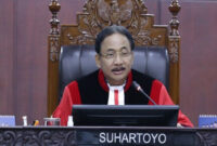 Ketua MK Suhartoyo saat membacakan amar putusan Perkara Nomor 62/PUU-XXII/2024, Kamis (2/1/2025).