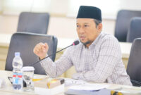 H Hilmy Muhammad.